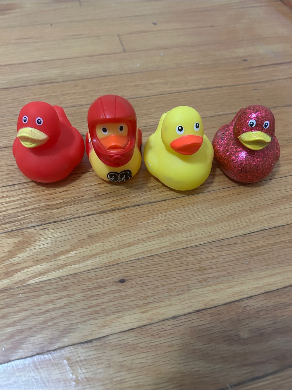 FREE | Set of 4 Kids Rubber Duck Bath Toys - Red, Yellow, Glitter Pink